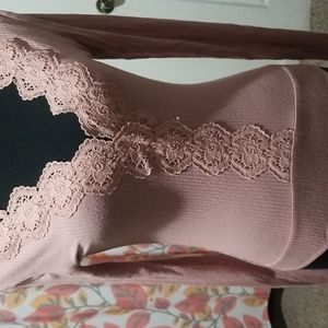 Long sleeve body suit .